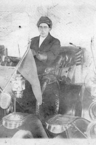 Man in old auto
