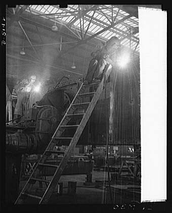 Production. M-4 tanks. Hull members of an M-4 tank on a...