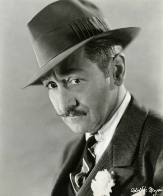 Adolphe Menjou.