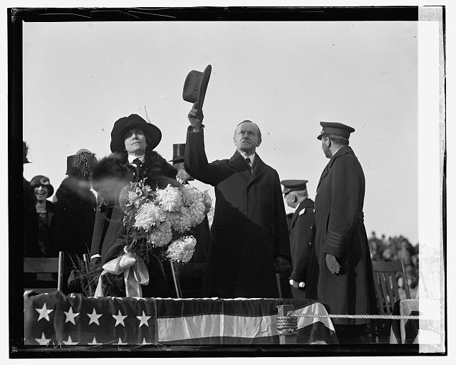 Pres. & Mrs. Coolidge and Capt. Andrews at Bowling Field,...