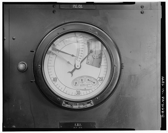 Close-up view of a general electric company demand meter...