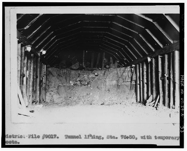 33. TUNNEL LINING AT STATION 76+50, SHOWING TEMPORARY...