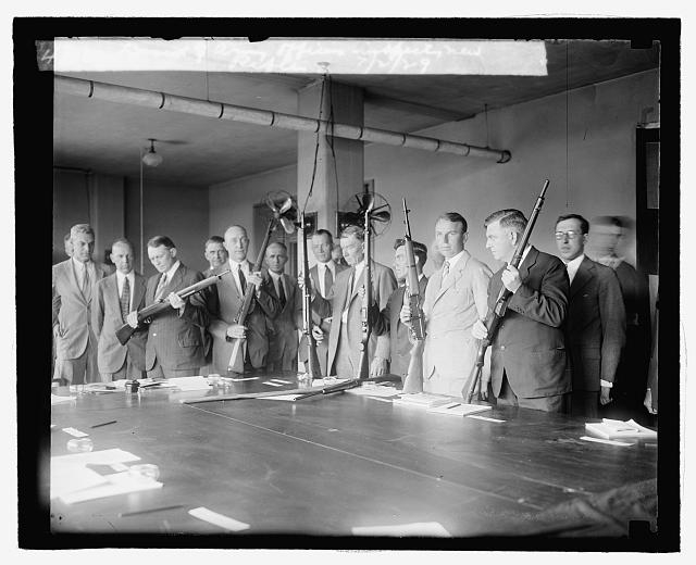 Board of Army Officers inspecting now rifiles, 7/2/29