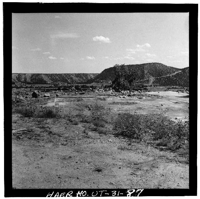 87. VIEW OF THE CONCRETE FOUNDATION FOR THE MINE MACHINE...