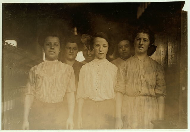 A group of spinners in Brookside Worsted Mills, Westford,...