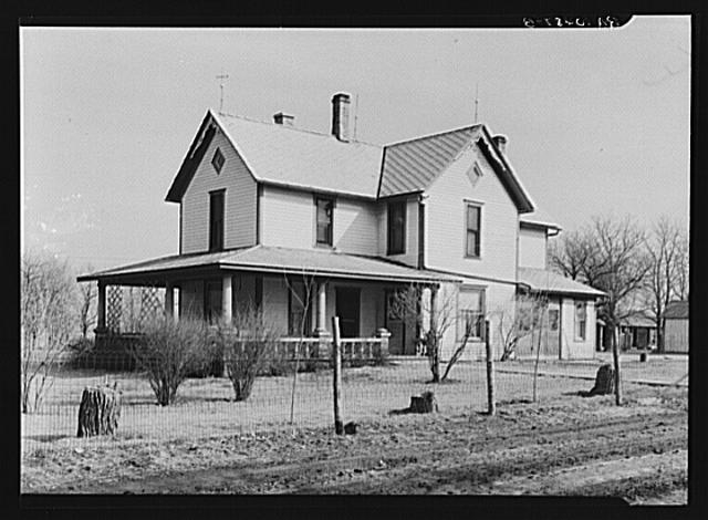 Farmhouse on the owner-operated two hundred thirty acre...