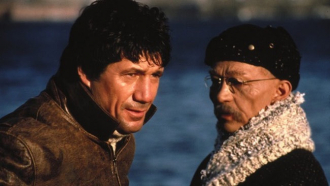 Fred Ward with Joel Grey as a Korean in REMO WILLIAMS.