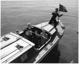 President Truman debarks to USS Augusta, escorted by Allan Rockwell McCann