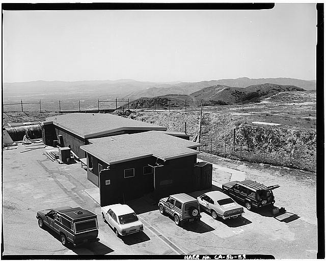 23. VIEW SHOWING BROWN CONCRETE BLOCK STRUCTURES AND...
