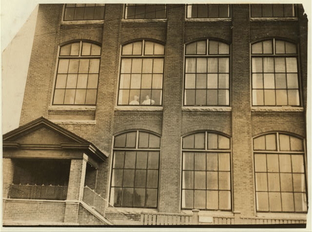 Girls flirting through window of Manomet Mill. Location:...
