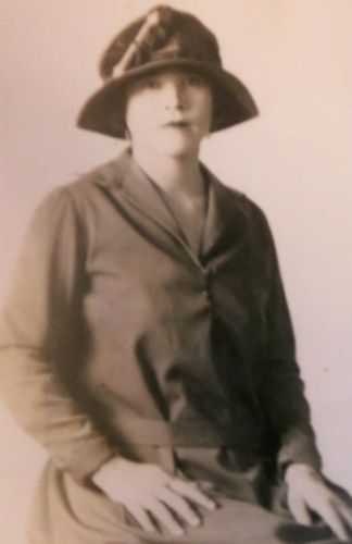 Dolores Lespron in a hat