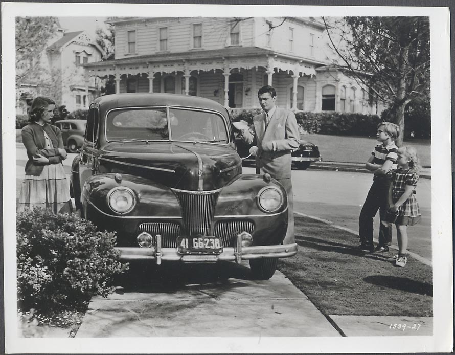 1941 Ford and a family