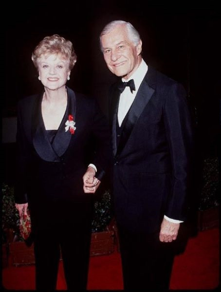 Angela with the handsome and debonair and devoted Peter Shaw.