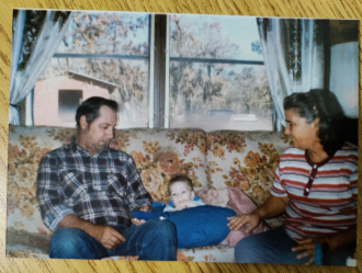 Dennis and his wife, Joyce with their grandson Spencer