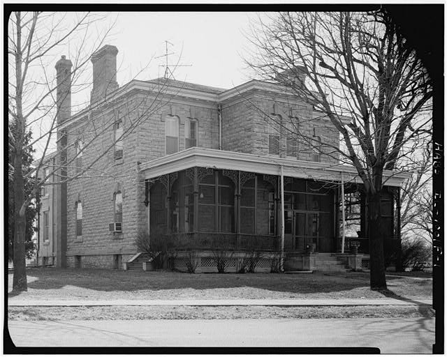 1. 3/4 view, showing E & N (front) elevations; looking...