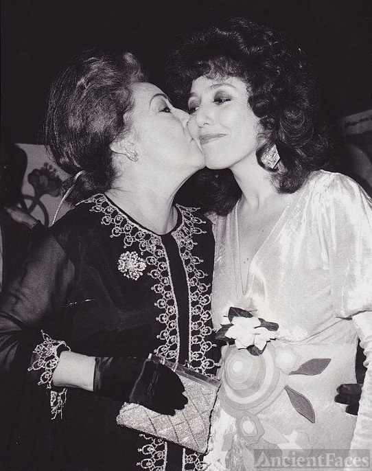 Ethel Merman kissing her daughter-in-law, Barbara Colby.