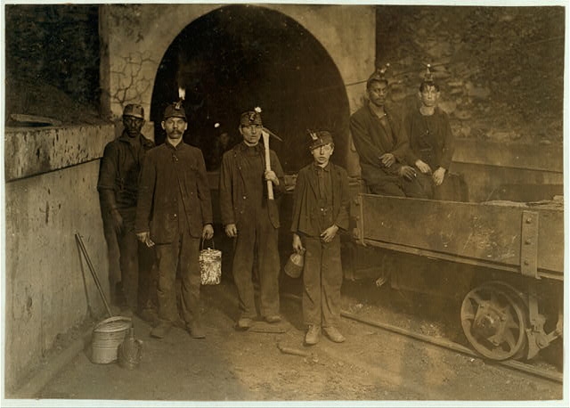 Main entrance, Gary W. Va. Mine. Trapper boy in center....