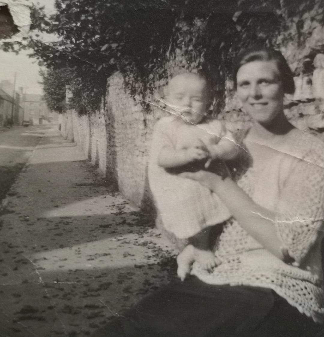 Lilian Collett holding baby Joan Collett at Bicester, Oxfordshire c.1922