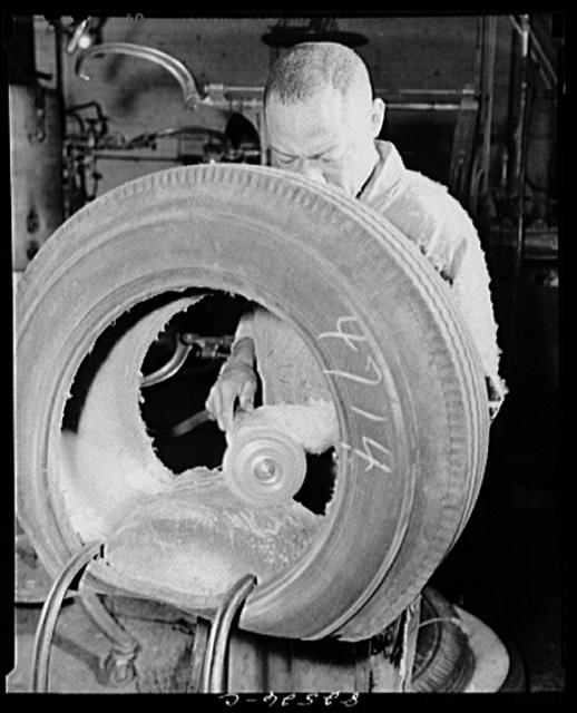 Washington, D.C. Washington tire store. Buffing the...