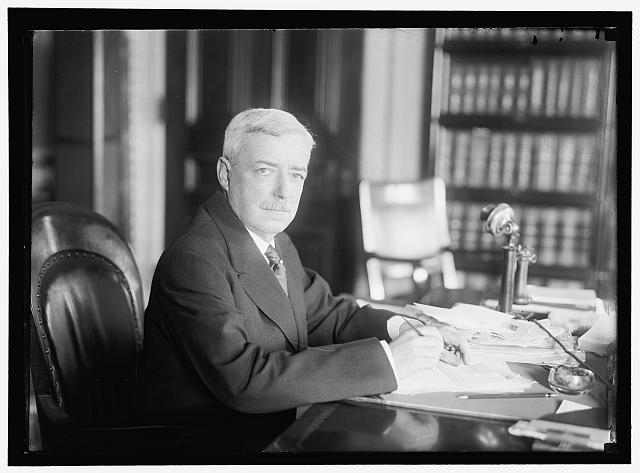 LANSING, ROBERT. SECRETARY OF STATE, 1915-1920. AT DESK