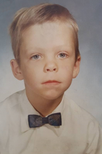 A serious Lawrence as a little boy.