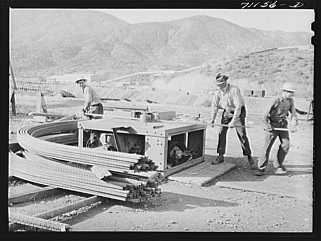 Bending reinforcing steel to be used in construction of...