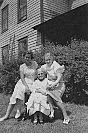Three women on lawn