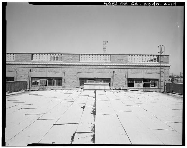 View of west end of loading dock roof and top of Express...