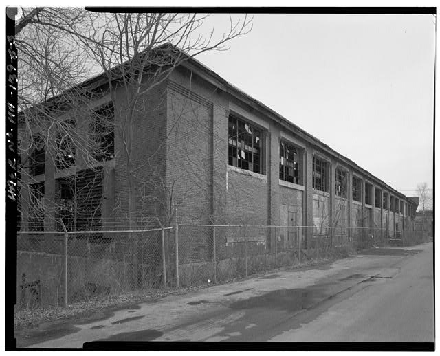 3. General oblique view of west facade showing brick...