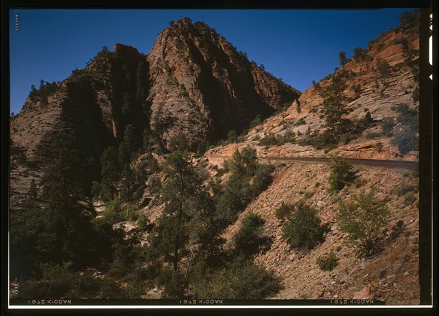 54. RETAINING WALL 0.9 MILE SOUTHEAST OF TUNNEL, FACING...