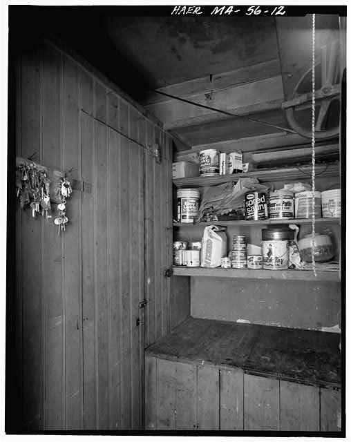 12. VIEW OF ELEVATOR MACHINE ROOM, SNOWING LOW CABINET...