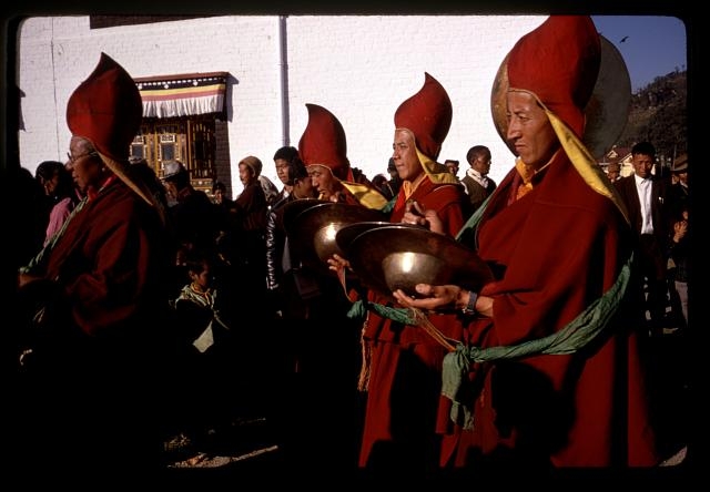 [Lamas playing cymbals during New Year's ceremony,...