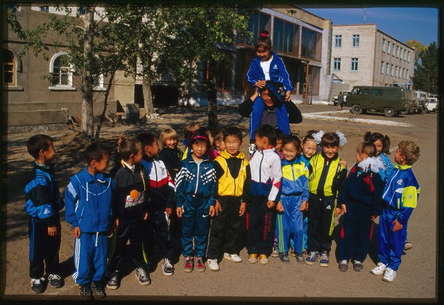 School children with teacher, Aginskoe, Russia