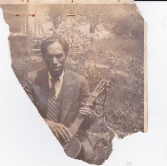African - American Man with Guitar