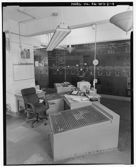 View southwest operator's console and button boards...