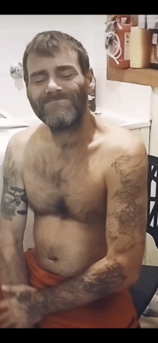 Showing off my tattoos.