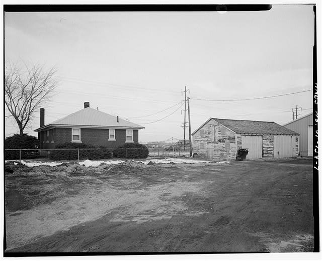 7. View of the house and two story chicken coop, looking...