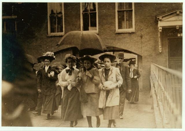 Noon, Saturday, May 22, 1909. Young girls working in...