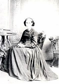 English Matron seated with folded hands