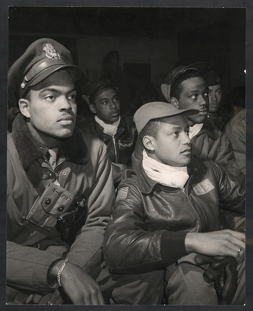 [Members of the 332nd Fighter Group attending a briefing...