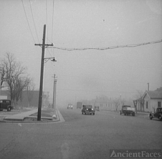 Texas autos driving through dust storm, 1936