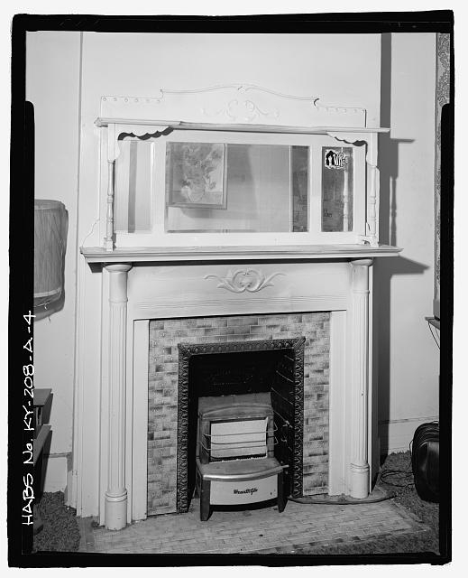 4. Detail view of fireplace in front room of second...