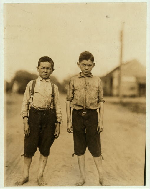 Two young workers in Spinning Room of Columbus Mill....