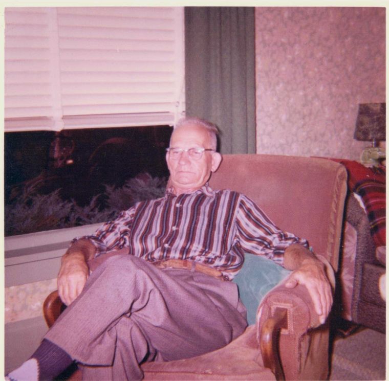 Frank sitting in his living room 1962