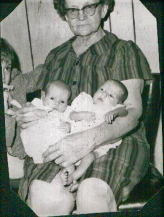 Juanita Kortman holding twins Kelly and Connie