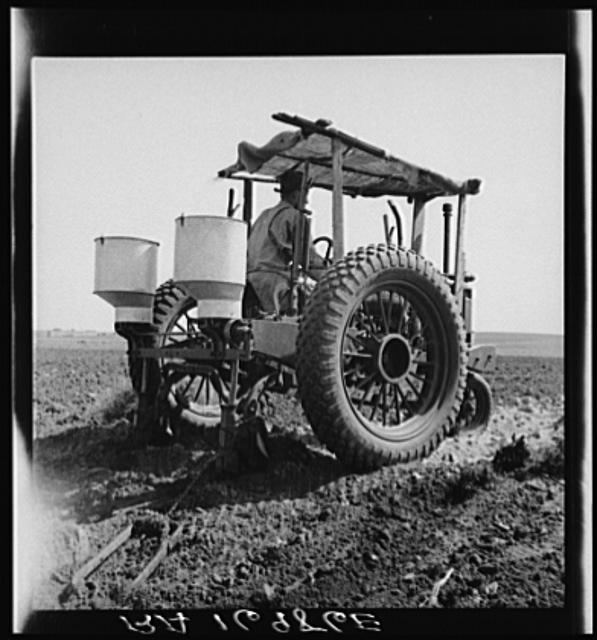 Tractor and operator. Navarro, Texas