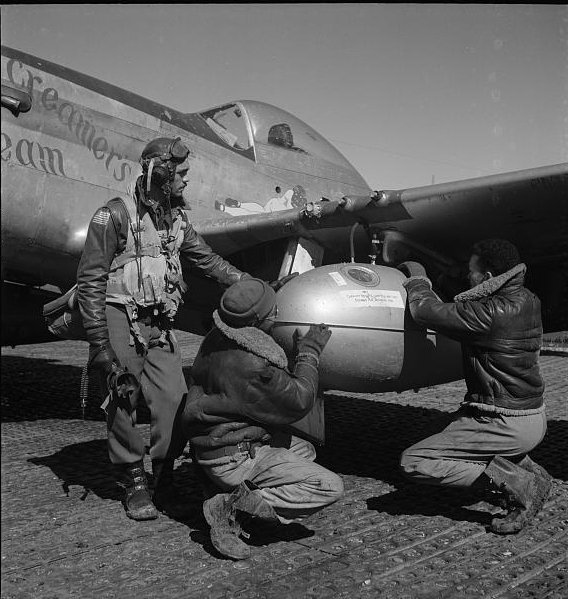 [Edward C. Gleed and two unidentifiedTuskegee airmen,...