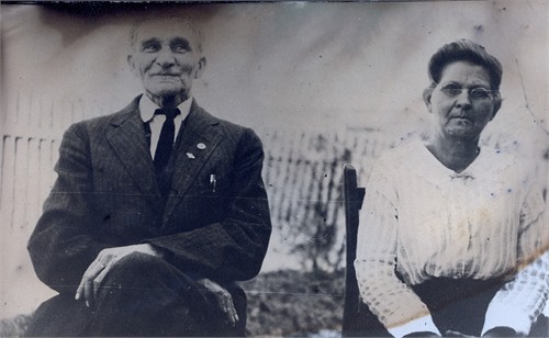 Oliver Smith Hutchens and wife, Lousettia E. Martin