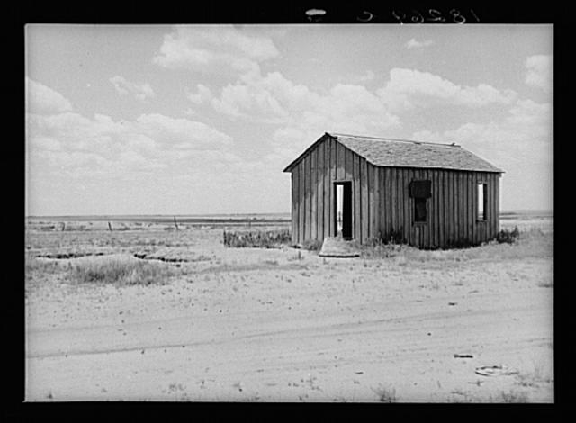 Drought-abandoned house on the edge of the Great Plains...