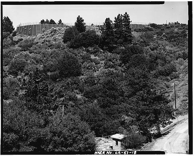 18. VIEW OF PUMP HOUSE, LOOKING NORTH. RETAINING WALL OF...